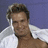 A split-screen image shows a person with light brown hair and white clothing on the left, against a purple background; the right side displays 'Vegas Baby' text in black-and-white pixelated style on blue.