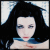 Pixelated image of a person with long dark hair and blue eyes, next to text reading 'X-O-Awards' on a dark background.