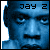 Two side-by-side pixelated frames of a blue-tinted human face with text "jay 2" above, showing subtle animation differences in facial features and text rendering.