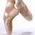 six shows a pair of ballet shoes in mid-air against white backgrounds, with pink and black text elements