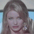 Static 50x50 pixel buddy icon showing a close-up of a person's face with long brown hair, visible ear, and partial shoulder in low-resolution grayscale tones.