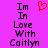 A static image with a bright pink background displays pixelated text reading "Im In Love With Caitlyn" in dark purple, accompanied by a red heart symbol above the text.