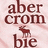 Pixelated text 'aber crom ble' in dark brown letters on light pink background with small brown animal figure between 'crom' and 'ble'.