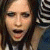 A small image shows a person with long brown hair and dark eye makeup in the top-left corner, while red text repeatedly displays 'Complicated' across black background.