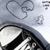 A static icon shows a light blue background with faint heart outlines and a partial view of mechanical components below.