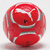 A circular red icon with white and gray accents, featuring a stylized design resembling a flower or abstract shape on a light background.