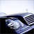 Animated car icon with blue and white color scheme showing a side view of a vehicle's front grille and headlight in three sequential frames.