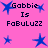 Pixelated blue stars and text on a pink background, with 'Gobbie Is FoBuLu22' repeated across the image.