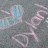 Pixelated image with four distinct sections: a gray background with pink text and blue shapes, a brown muffin on dark brown background, light blue background with pink text and green heart, and solid gray section.