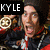 Animated sequence showing two figures with exaggerated expressions, one labeled 'KYLE' and the other 'LOZA', holding circular objects against a dark background.