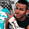 Static buddy icon featuring a person making a peace sign with visible tattoos, set against a background of blue and white abstract shapes and black-and-white checkered patterns.