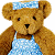 A pixelated teddy bear in a blue dress with white dots and matching headband on the left, next to green text reading "Original Icons .com" on a dark green background on the right.