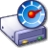 Pixelated blue and white object with a circular top section containing red and orange elements, resting on a purple base with small colored accents.