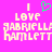 Pixelated text on bright pink background with green heart symbol above 'I LOVE GABRIELLA HAMLETT' in light yellow letters.