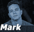Pixelated portrait of a person with short dark hair against black background, white text 'Mark' at bottom.