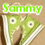 Green cartoon character with large eyes and a wide mouth, labeled 'Sammy' in bright green text above.