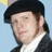 Static 48x48 pixel icon showing a person in historical attire with dark hair, wearing a black cap and white collar against a light blue background.