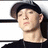 A pixelated image of a person wearing a dark cap and black shirt against a white background, with orange text blocks reading "U DONT KNOW ME" and "CAUSE IM THE REAL SLIM SHADY".