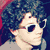 A four- shows a person with curly hair in different poses and outfits, including sunglasses and a bow tie, with text reading "bitch please. I'm nick jonas."