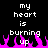 Pixelated text reads 'my heart is burning up' above bright pink flames on a black background.