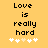 Yellow background with black text reading "Love is really hard" and five white plus signs below, where the third sign changes from light yellow to white.