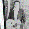 A four- shows a person playing guitar, a close-up of hands on guitar strings, a face, and text reading '26 miles sean watkins' on a blue background