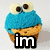 Blue cupcake with white eyes and brown pupils, each with black text overlay: 'im', 'da', 'cookie', 'mon-', 'sta' across six