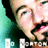 Pixelated close-up of a person with light skin, dark hair, and green eyes wearing a dark shirt against a teal background.