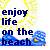 Pixelated text reads 'enjoy life on the beach' over a yellow and blue background with a small yellow and green object on the right.