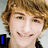 A pixelated image of a person with light brown hair and fair skin, showing three variations where text overlays change from 'I' to 'love' to 'FRCD'.