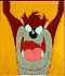 Animated cartoon character with brown fur and gray face, showing three sequential expressions against orange background.