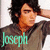 Pixelated image of a person with dark hair and light skin wearing a brown shirt, with the name 'Joseph' in teal text overlaid on the chest area.