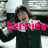 A person in a dark sweater with white collar extends arms in a repeated motion , with pink text overlays reading 'berries', 'and', and 'cream' in sequence