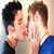 Two side-by-side animated frames showing a couple kissing, one in color and one in black-and-white.