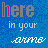 Blue background with repeated text 'here in your arms' where the word 'here' alternates between gray and pink, some frames include small pink hearts near 'here'.