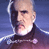 Pixelated static image of a bald man with dark sideburns wearing a black high-collared outfit against a blue gradient background.