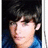 A pixelated portrait of a person with dark hair and a blue shirt, with a purple text overlay reading 'HOTTIE!' in the top-right corner.