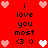 Red background with pixelated text 'i love you most (3 :)' and heart symbols in pink, white, and light red hues arranged symmetrically.