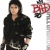 A pixelated figure in dark clothing stands against a white background with a red and black graphic element to the right.