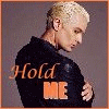 A four- shows a person with short blonde hair in profile, wearing a black leather jacket against a gray background. Text overlays read "Hold ME," "Thrill ME," and "Kiss ME"