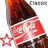 Pixelated Coca-Cola bottle with red label and white text, accompanied by orange 'Coca', 'Cola', and 'Classic x3' text on dark green background.