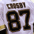A split-screen image showing a hockey jersey with 'CROSBY 87' on the top-left, yellow background text reading 'Pittsburgh penguins hottest', and 'captain #87' below.