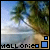 Pixelated beach scene with palm tree, ocean, and sand; text "MALLONIE" below with blue/white squares. Animated change: white square shifts from left to right across bottom-right corner.