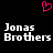 Pixelated pink heart symbol above white text reading 'Jonas Brothers' on black background.