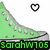 Green high-top sneaker with white laces and gray toe cap, heart symbol above, text 'Sarahw705' below on black bar.