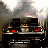 Pixelated static image of a dark vehicle with illuminated elements against a cloudy sky background, likely from a movie scene.