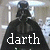 Darth Vader silhouette with text 'darth' on left and 'vader.' on right, pixelated background.