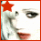 A pixelated face with red lips, black eyeliner, and a red star on the forehead; two side-by-side frames show slight mouth movement.