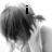 Black-and-white image of a person with long hair in four , text changes from 'i' to 'love' to 'him' across the top-left, top-right, and bottom-left sections