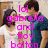 Two people stand side-by-side in a room with wooden trim; one wears a white shirt and the other a blue shirt, with pink text overlaid on the image.